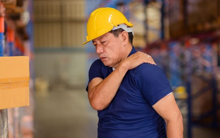 A worker suffering from a back pain wondering if he can file a workers compensation claim?